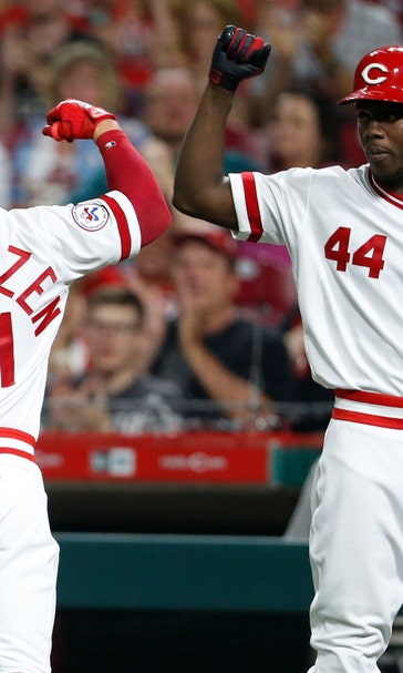 Aquino, Reds drop Cards into first-place tie with 6-1 win
